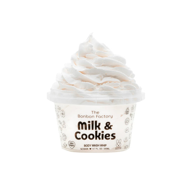A cup of MILK & COOKIES BODY WASH WHIP by The Bonbon Factory on a white background, featuring vegan ingredients.