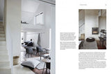 The interior of a home with stairs and For The Love Of White: The White & Neutral Home furniture by Books.