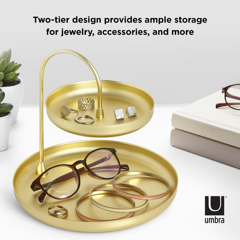 The Umbra Poise Two Tier Ring Dish Brass offers a jewelry holder and accessory organizer that provides simple storage for jewelry accessories.