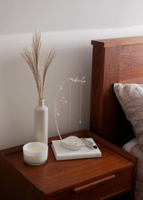 A wooden ORCHID JEWELLERY STAND by Umbra.