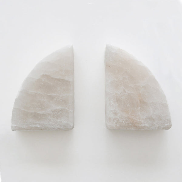Two limited edition pieces of Stone Rounded Bookends by Papier HQ on a white surface.