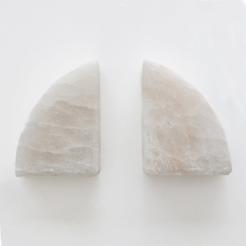Two limited edition pieces of Stone Rounded Bookends by Papier HQ on a white surface.