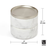 A modern design storage solution, the Umbra TESORA MARBLE BOX with a metal lid serves as a sophisticated jewelry box.