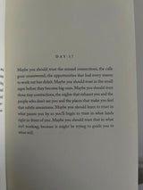 An inspiring "Thought Catalog - The Pivot Year" book opens to reveal motivational insights.