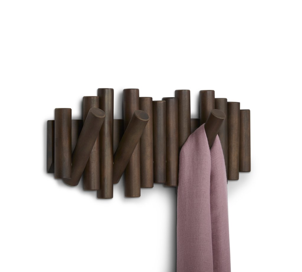 Umbra Picket rail wall hook in walnut holding a pink scarf