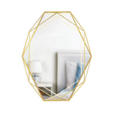 The Umbra Prisma Mirror - Brass is a contemporary geometric mirror featuring a gold color and a stylish design.