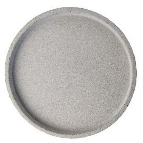Round natural concrete tray styled with a candle and diffuser