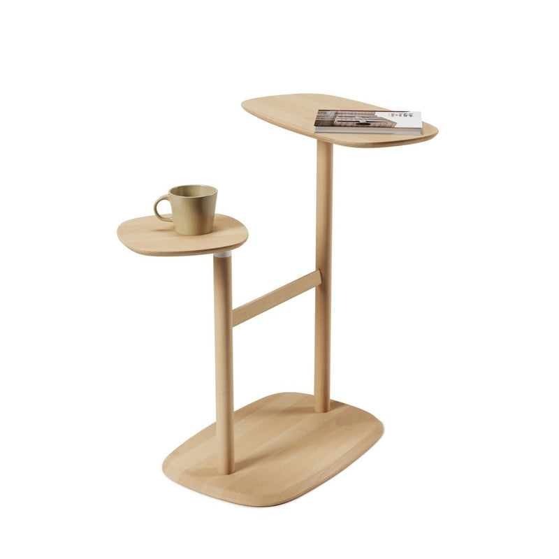 A versatile Swivo Side Table - Natural from Umbra with a swivelling table top, perfect for conveniently placing a cup and magazine while adding a touch of elegance with its wooden design.