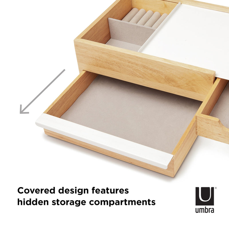 An Umbra STOWIT JEWELRY BOX NATURAL with hidden compartments and storage drawers.