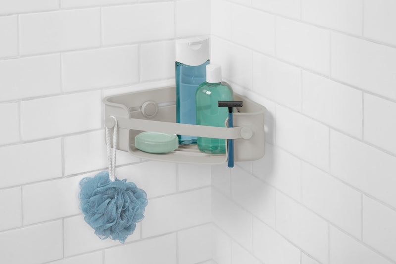 A shower with an Umbra Flex Gel-Lock Corner Bin for underutilized corner space organization.