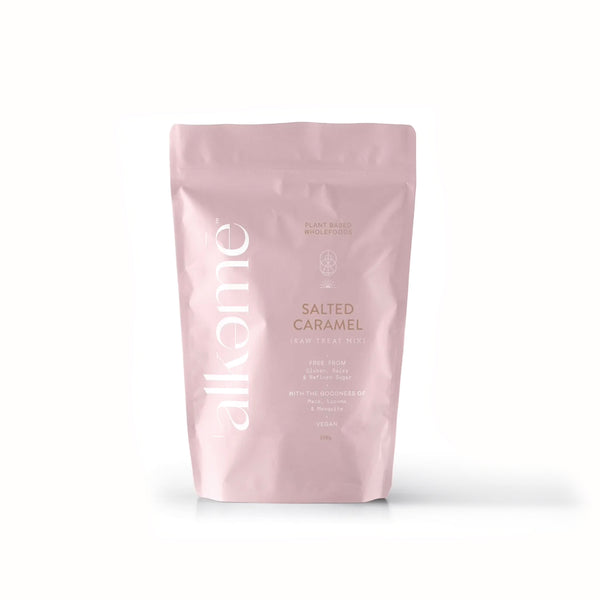 A guilt-free Salted Caramel Raw Treat Mix bag with the word Alkeme Wholefoods on it.