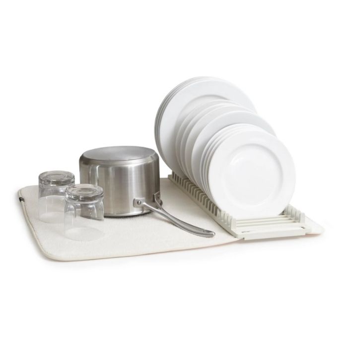 Umbra Udry dish rack in linen holding plates, glasses and a pot on its drying mat