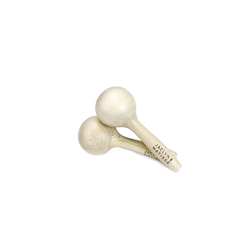 A pair of Jaclyn and Matisse Wooden Maraca Pair on a white background.