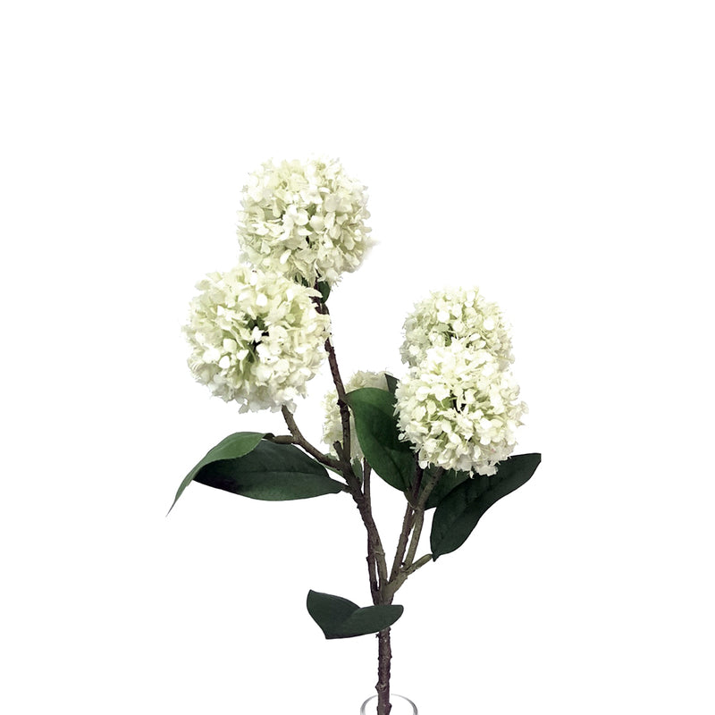 Roseum Snowball White 53cm flowers in a vase on a white background, enhanced with greenery for a tasteful floral styling by Artificial Flora.