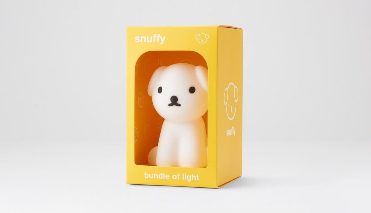 Snuffy dog lamp in its yellow box