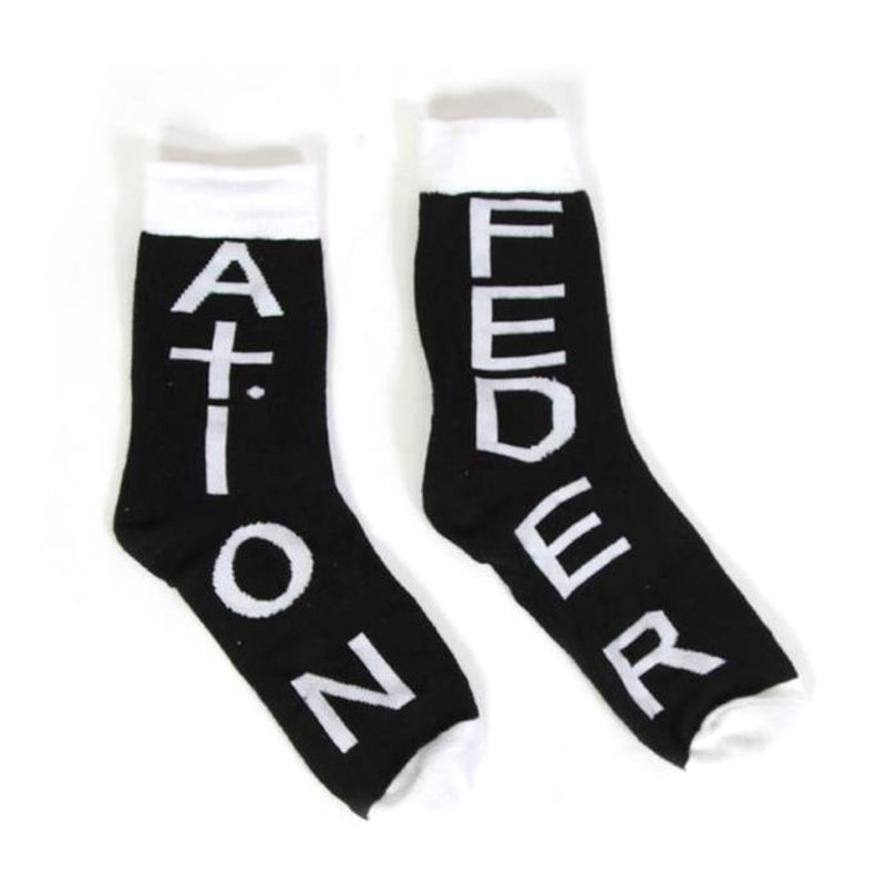 A soft pack of Federation black and white socks with the word 'feeder' on them.