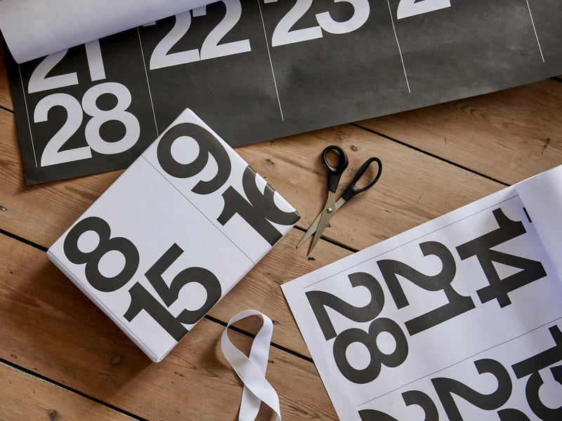 Stendig wall calendar close-up showing bold numerals and grid typography