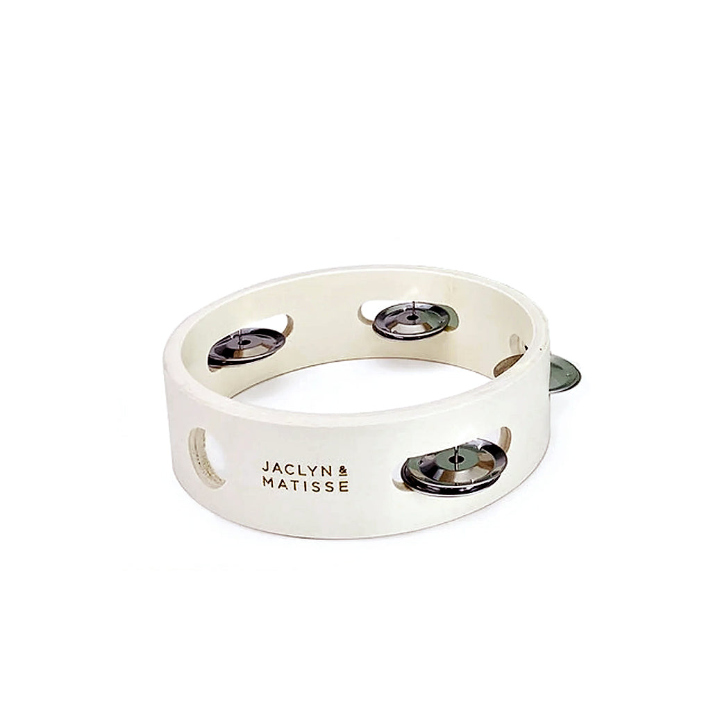 White wooden tambourine with silver jingles, on white
