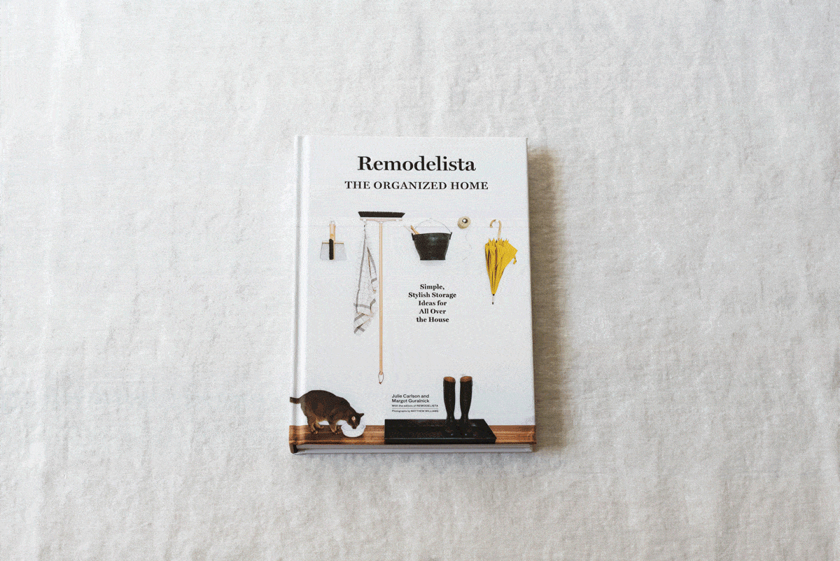 Remodelista The Organised Home book page spread showing a kitchen