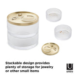 The Umbra Tesora Storage Box offers a modern and stackable storage solution for jewelry or other small items.