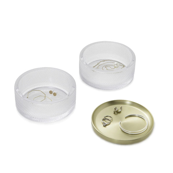 A pair of gold plated earring trays and a gold plated ring in a modern design, perfect for storage solution within the Umbra Tesora Storage Box.