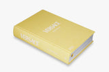 A yellow book with the word Books Catwalk: The Complete Fashion Collections - Various Options on it.