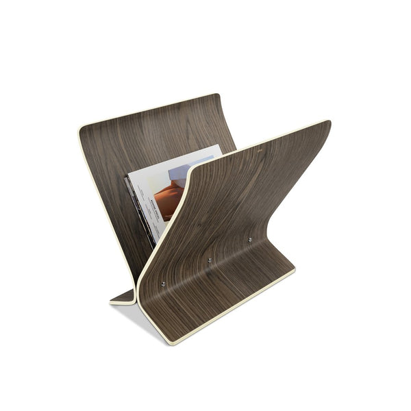 An Arling magazine rack - aged walnut, a modern storage solution for magazines by Umbra.