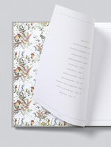 A Write To Me guided journal, Together - Planning Our Day, with a floral pattern on it.