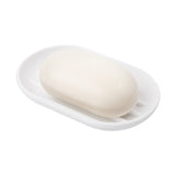 The Umbra Touch Soap Dish from the Umbra range features a soft-touch finish and is displayed on a white background.