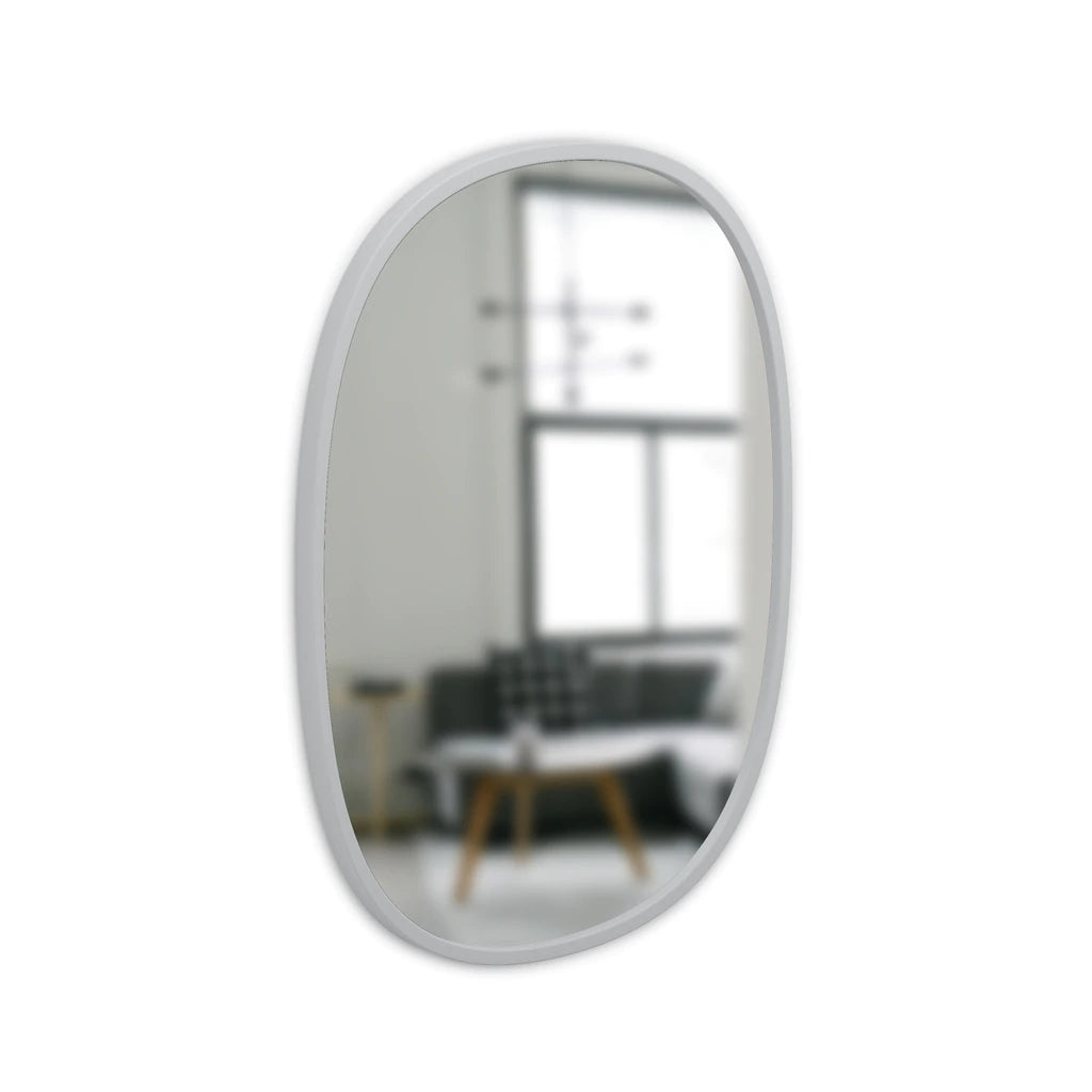 Hub oval mirror by Umbra in grey, hung portrait with a grey rubber rim