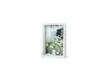 A modern Edge Marble Frame picture frame from the Umbra range.