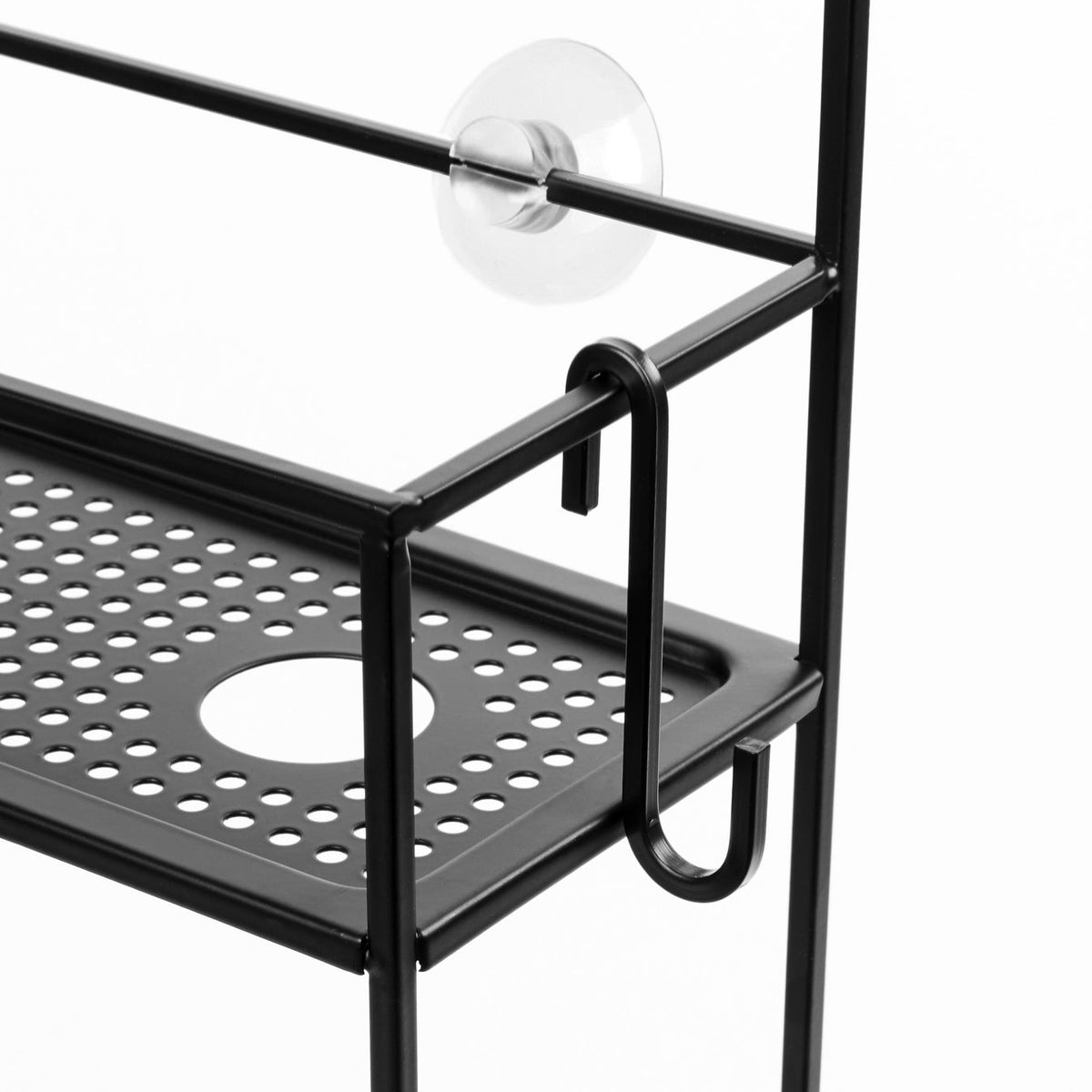 Close-up of the Umbra Cubiko shower caddy in black, perforated shelf and cup holder